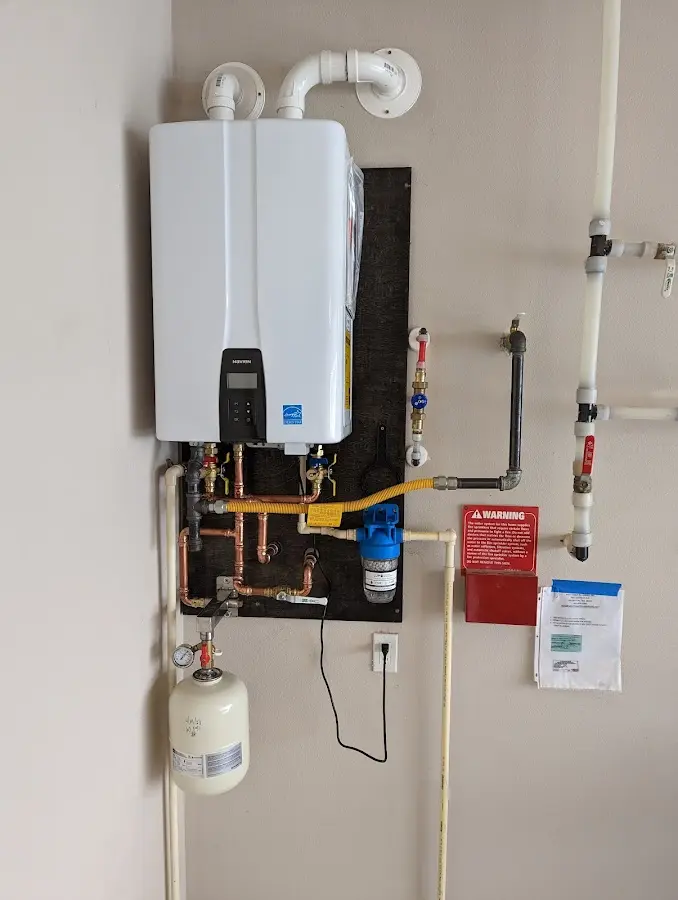 Professional plumber installing copper piping in a Azalea Park home